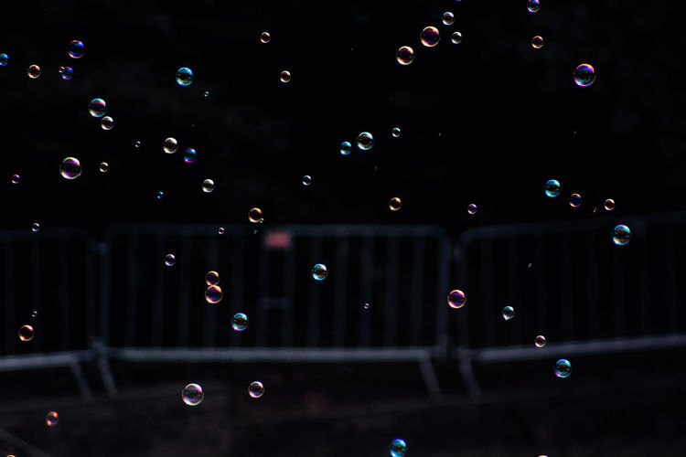 Full frame shot of illuminated bubbles