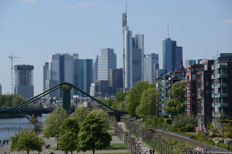 Modern buildings in city against sky