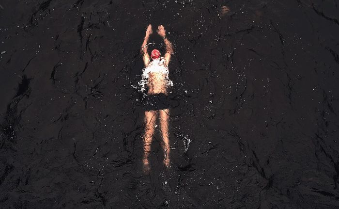 High angle view of person swimming in water