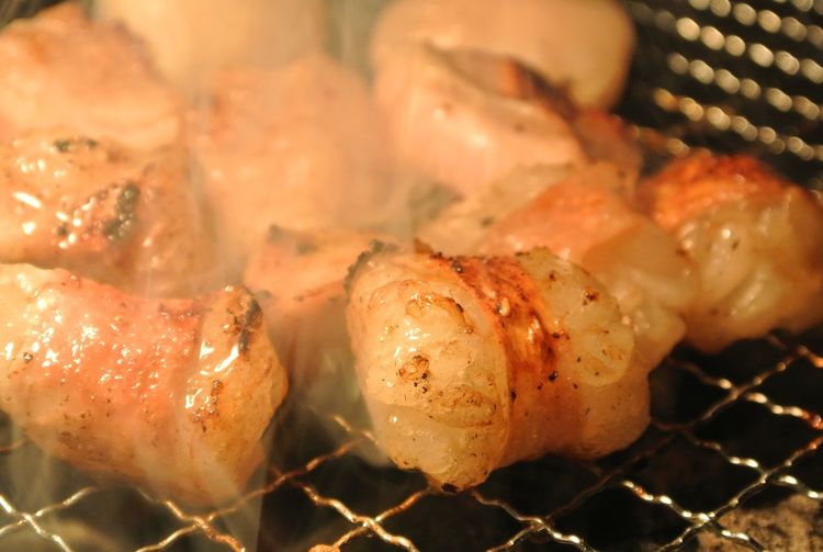 Close-up of meat on barbecue grill