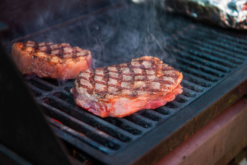 Close-up of meat on barbecue grill