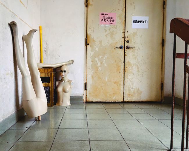 Abandoned mannequins in room