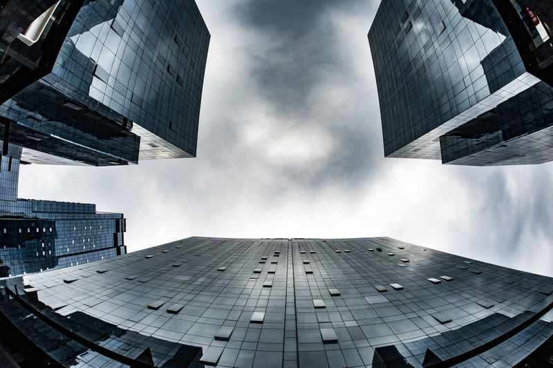 Low angle view of modern buildings against sky