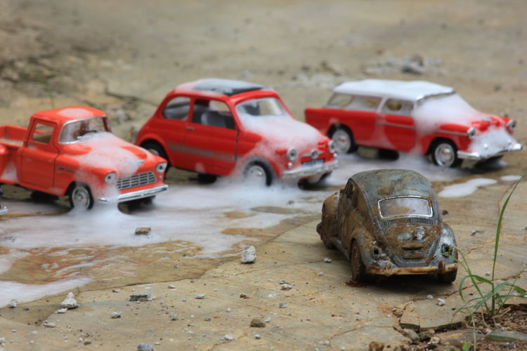 Abandoned toy car on land