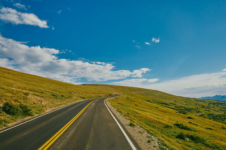 Open highway through rocky mountains national park in colorado.