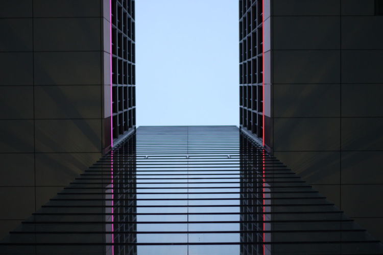 Low angle view of modern building against clear sky