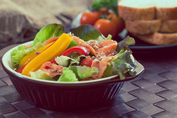 Close-up of fresh salad in bowl on table