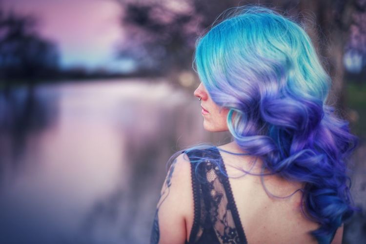 Rear view of dyed hair woman