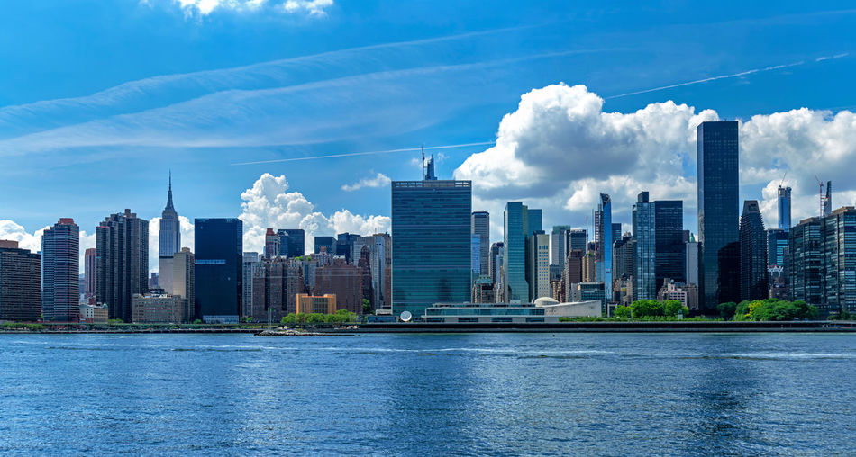 Modern buildings in city against sky