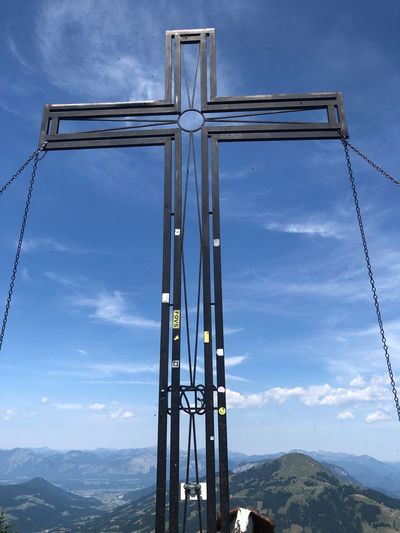 Low angle view of metallic structure against sky - summit cross - alps austria