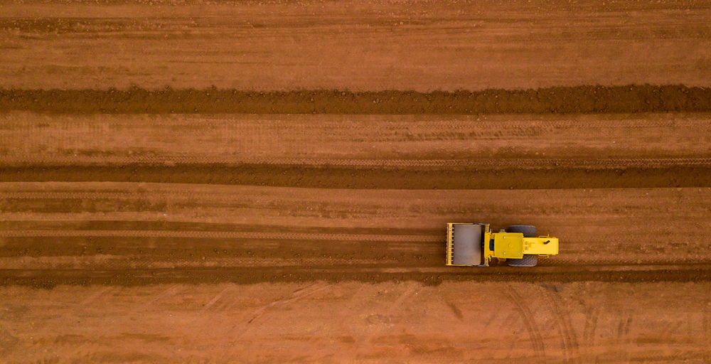 High angle view of yellow truck on field