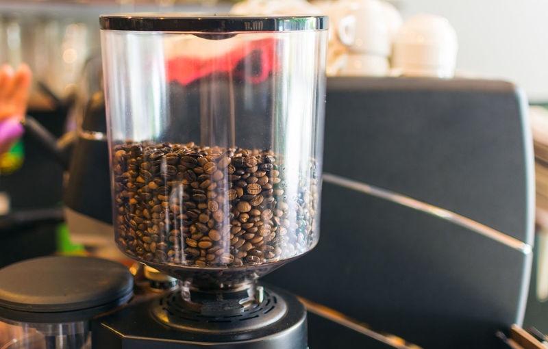 Close-up of coffee beans in machine