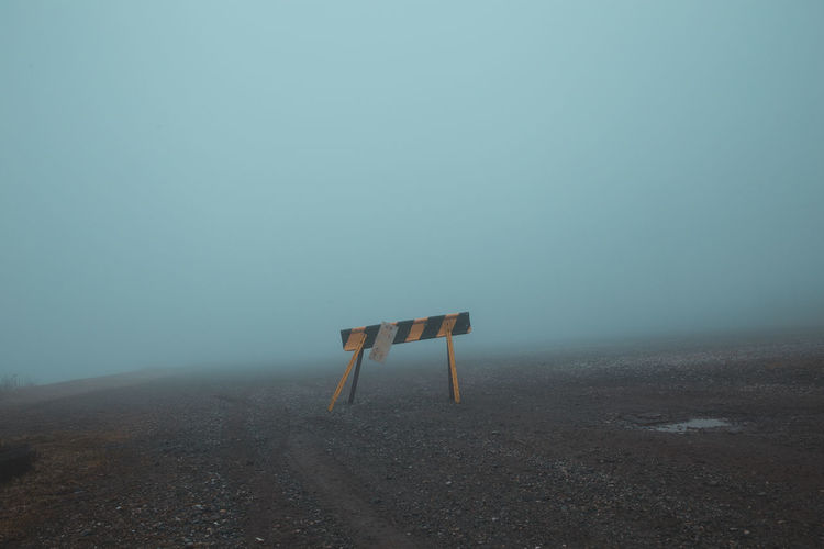 Empty road against clear sky