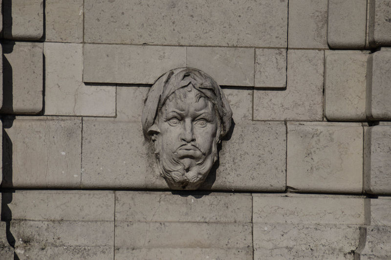 Close-up of statue against wall