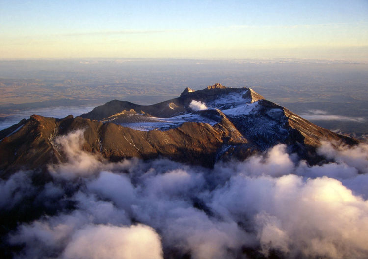 High angle view of mountain covered with clouds