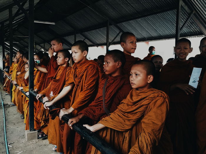 Monks standing in temple