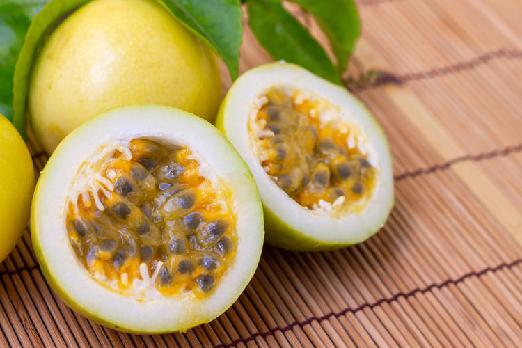 Close-up of passion fruits on table