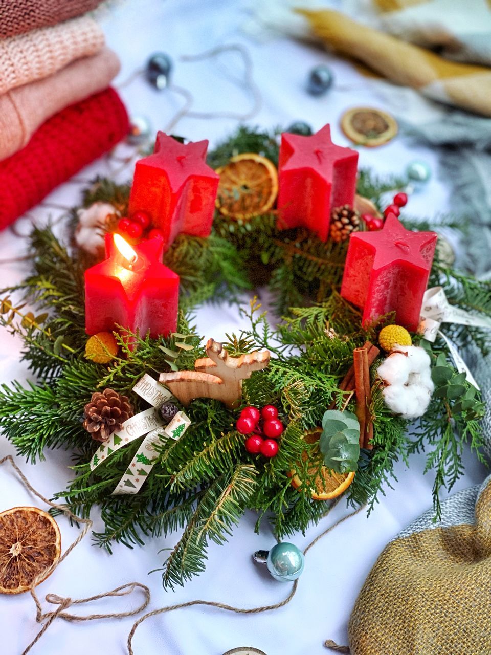 holiday, christmas, celebration, christmas decoration, plant, decoration, christmas ornament, tree, winter, christmas tree, tradition, nature, no people, indoors, candle, high angle view, flower, food and drink, event, food, pine cone, still life, red, gift, wreath, advent, cold temperature, ribbon
