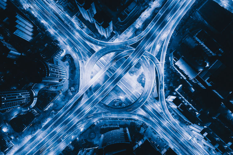 Directly above shot of intertwined highways at night