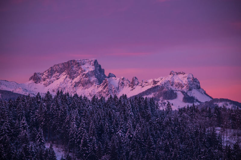 Scenic view of mountains against sky during sunset