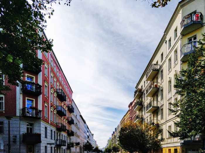 Low angle view of buildings in berlin against sky