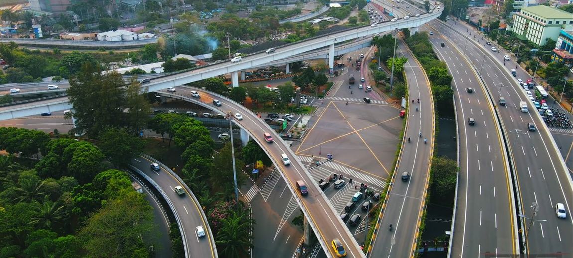 High angle view of vehicles on road in city