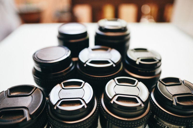 High angle view of camera lenses on table