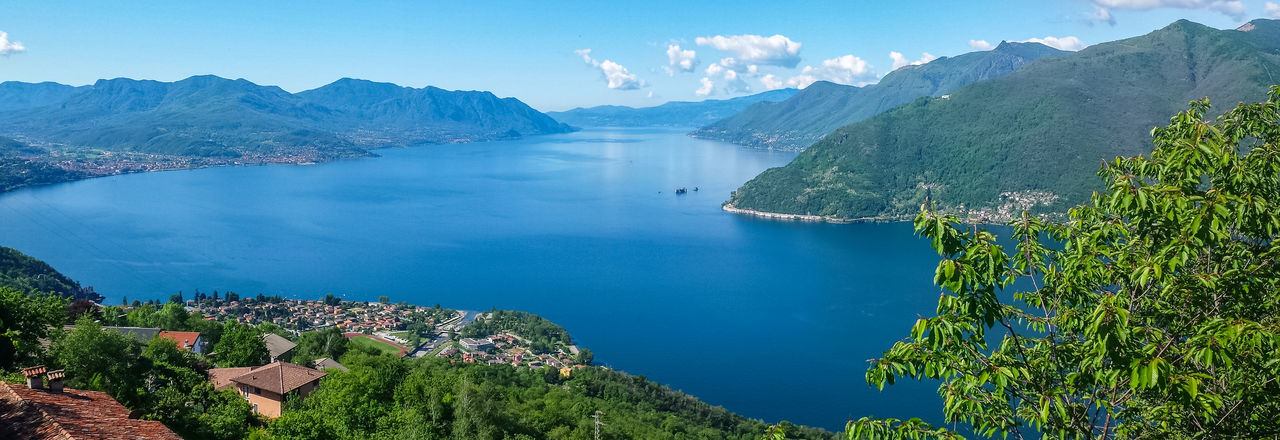 Aerial wide angle view on lake maggiore and the alps