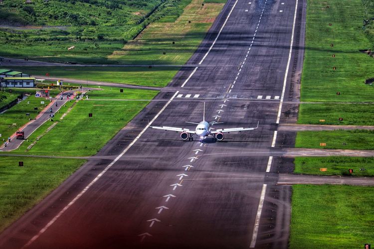 High angle view of airplane on road