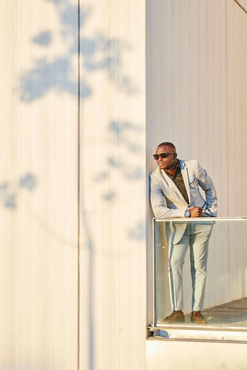 African american businessman at sunset in a building.