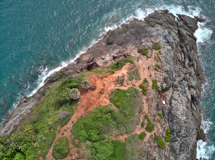 High angle view of rock formation on beach