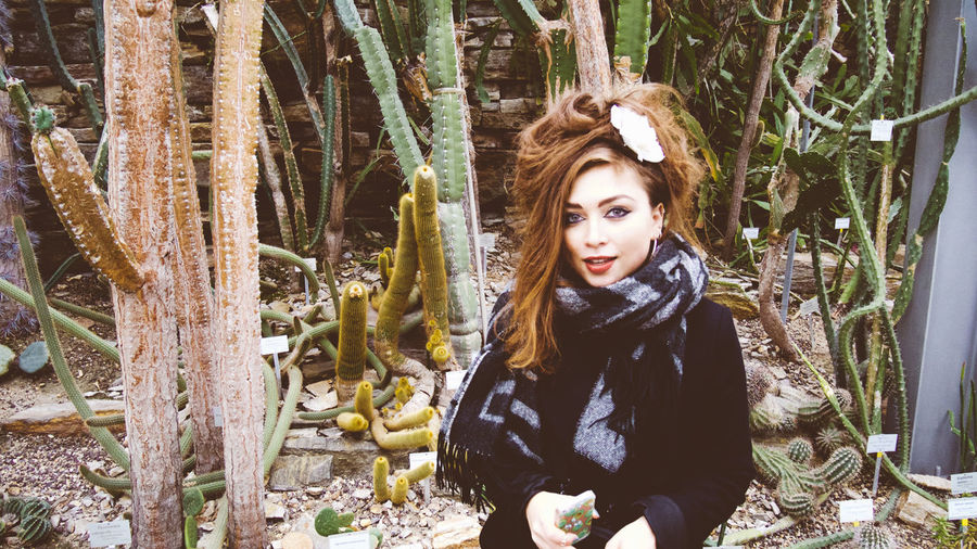 Portrait of young woman in forest