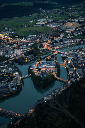 Aerial view of modern salzburg city with residential buildings located on shore of river in austria