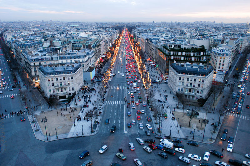 High angle view of busy street amidst buildings in city