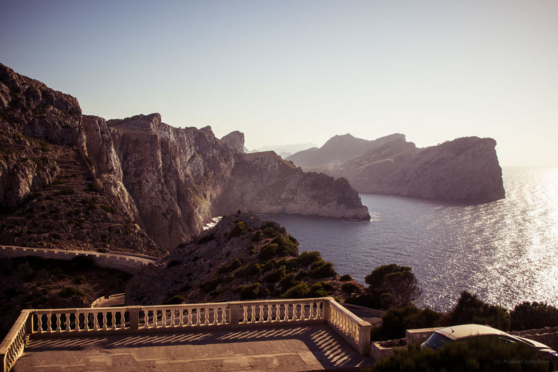Scenic view of sea and mountains against clear sky, cap formentor, mallorca 