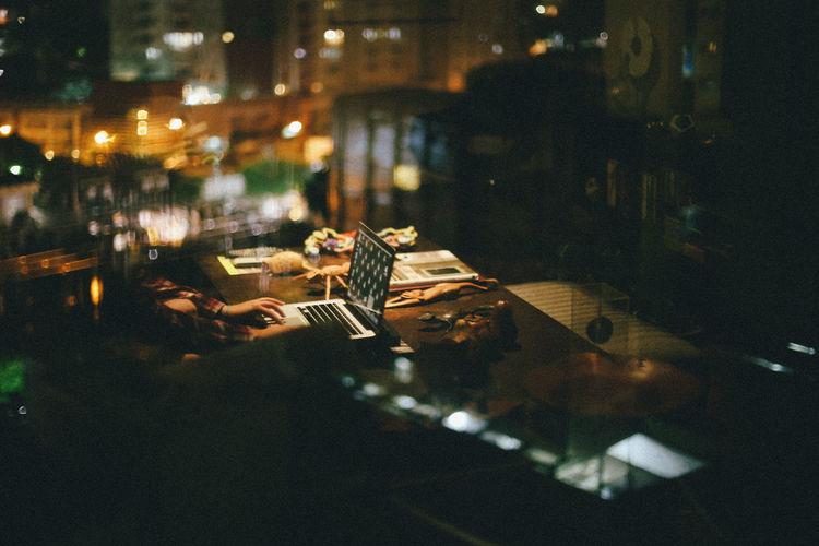 City life Abstract Artistic Arts Culture And Entertainment Computer Fantasy Hands Hands At Work Illuminated Indoors Laptop Music Musical Instrument Night Nightlife No People Notebook Notebooks Reflection Reflection_collection Reflections Sound Mixer Working Fresh on Market 2017 The Portraitist - 2017 EyeEm Awards