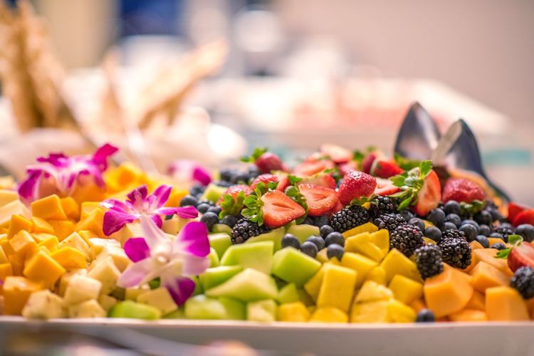 Close-up of chopped fruits on table