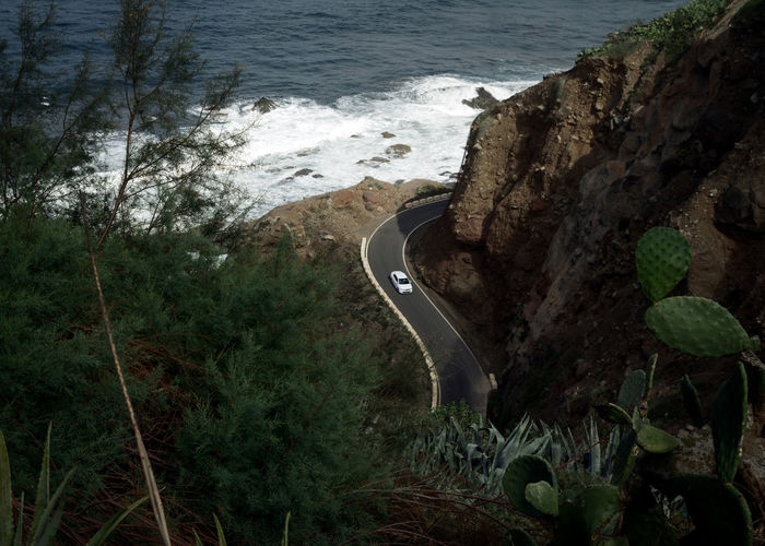 High angle view of rocks by sea