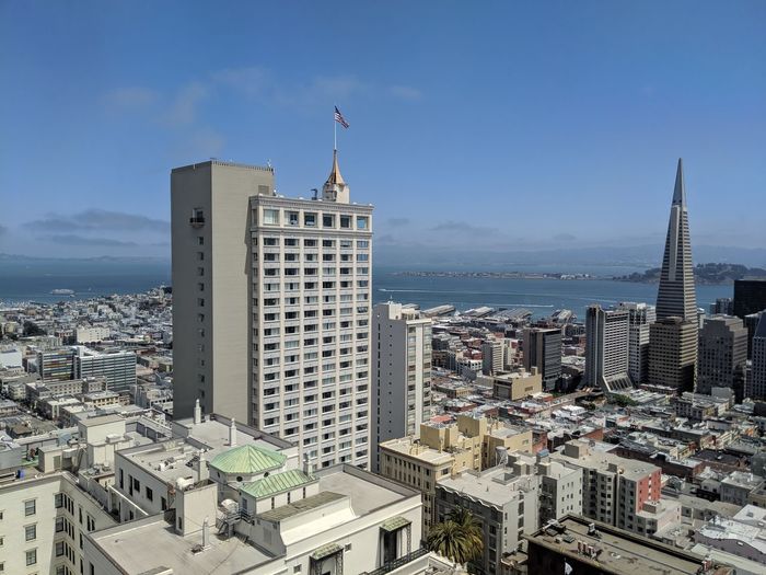 Buildings in city against sky