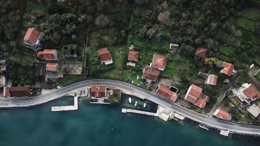Aerial view of houses by sea