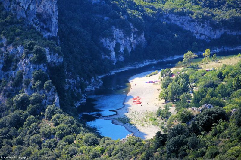High angle view of ardeche river by mountain