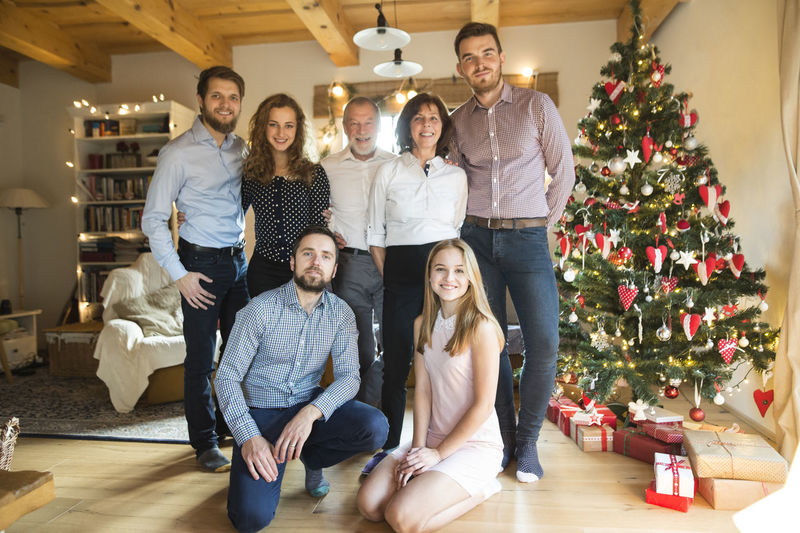Portrait of family at christmas tree