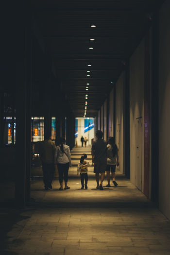 People walking in corridor