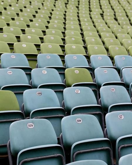 Full frame shot of empty chairs in stadium 
