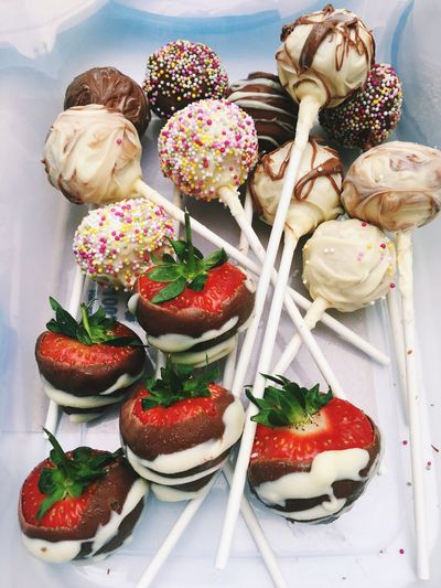 High angle view of fruit and cake pops