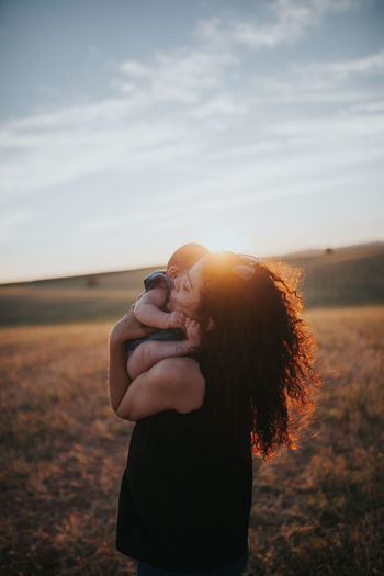 Baby Family Family Matters Family❤ Mother Mother & Daughter Motherhood Baby ❤ Babygirl Babyhood Casual Clothing Emotion Family With One Child Field Hairstyle Holding Land Nature Outdoors Positive Emotion Real People Sky Sunlight Togetherness Women 50 Ways Of Seeing: Gratitude Moms & Dads