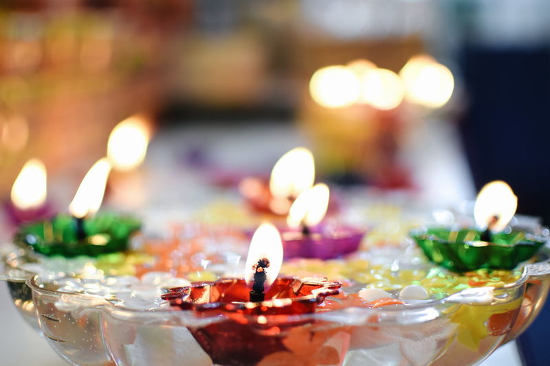 Close-up of tea light candles in bowl