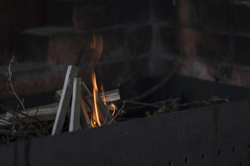 Close-up of fire on log