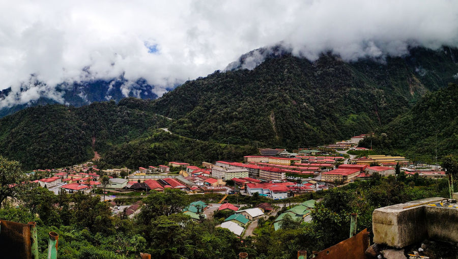 Panoramic shot of townscape against mountains