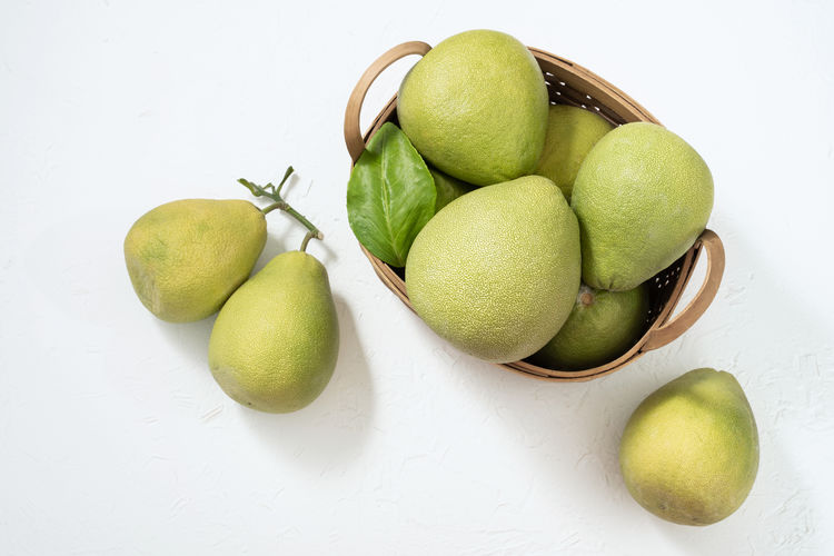 High angle view of fruits on white background